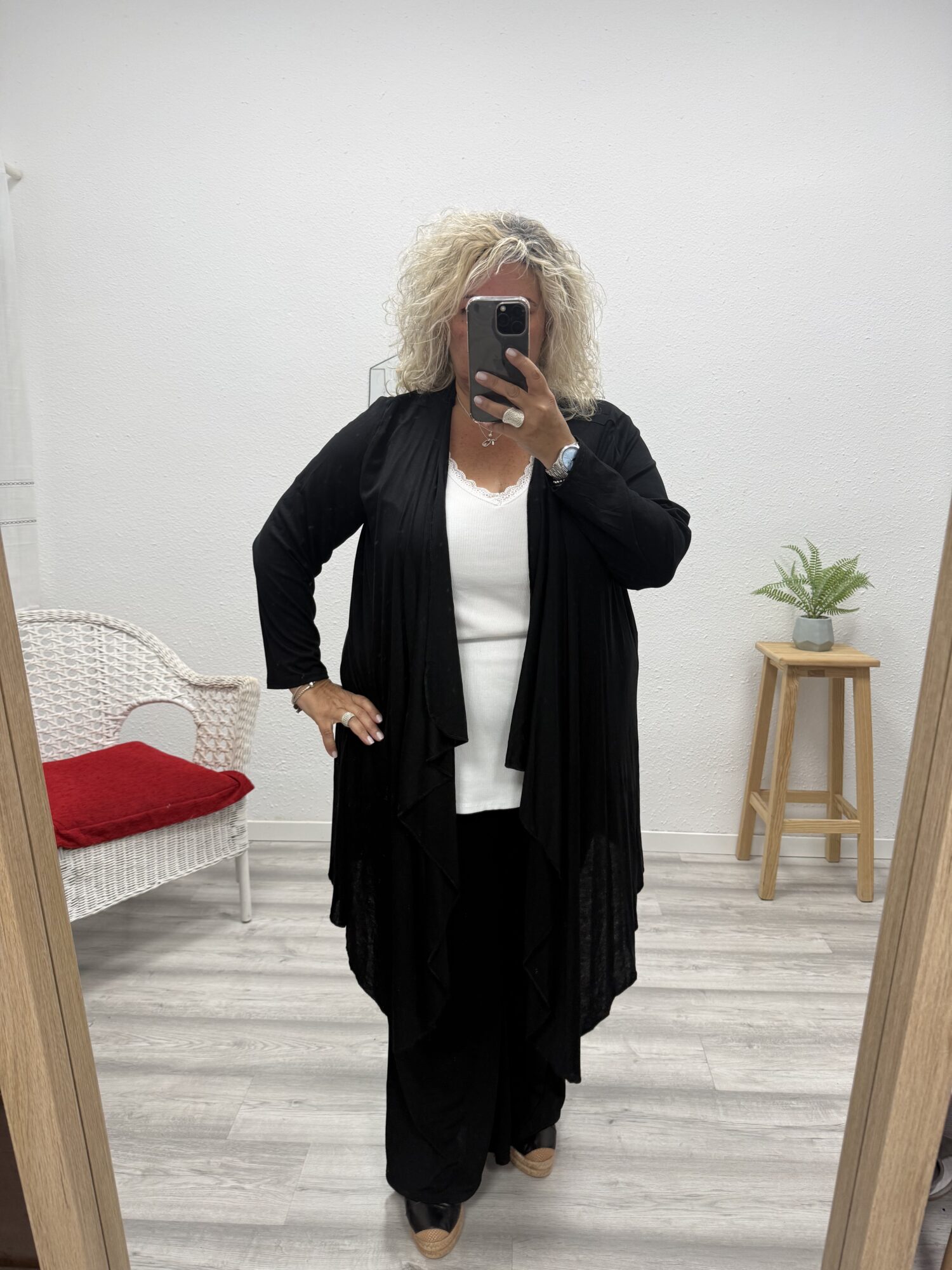 Chaqueta punto fino asimétrica negra