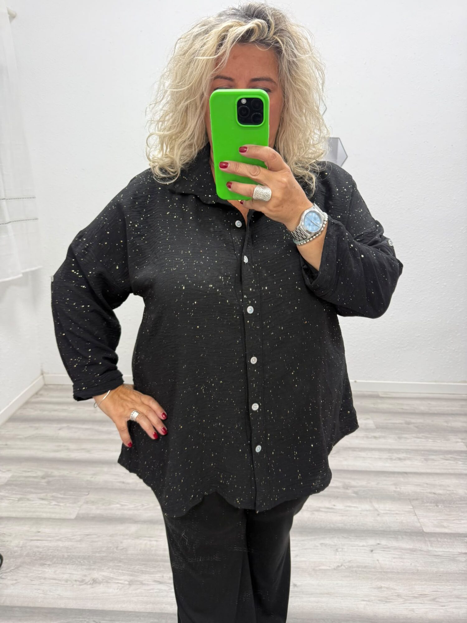 Blusa negra y dorado