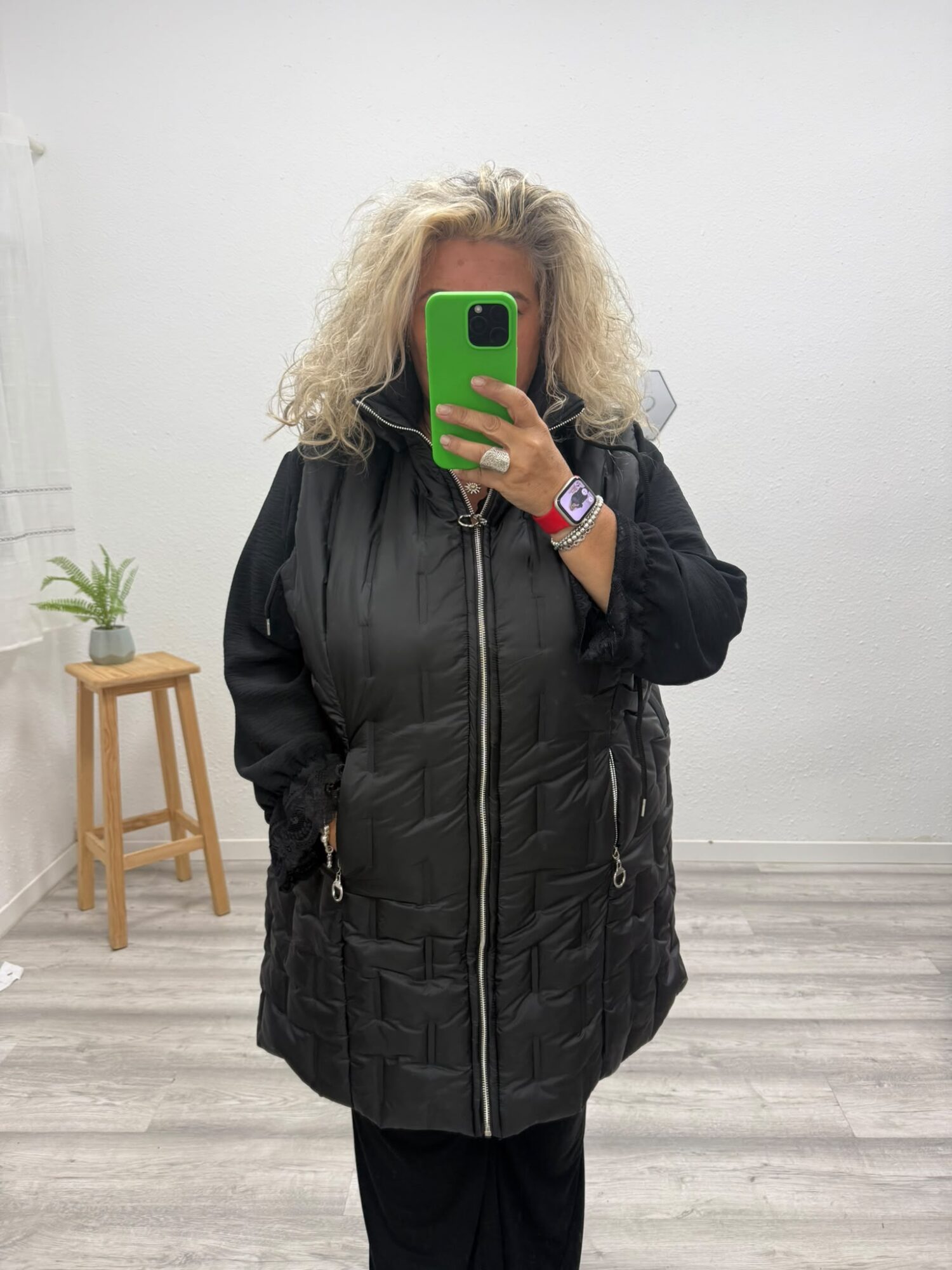 Chaleco plumas negro